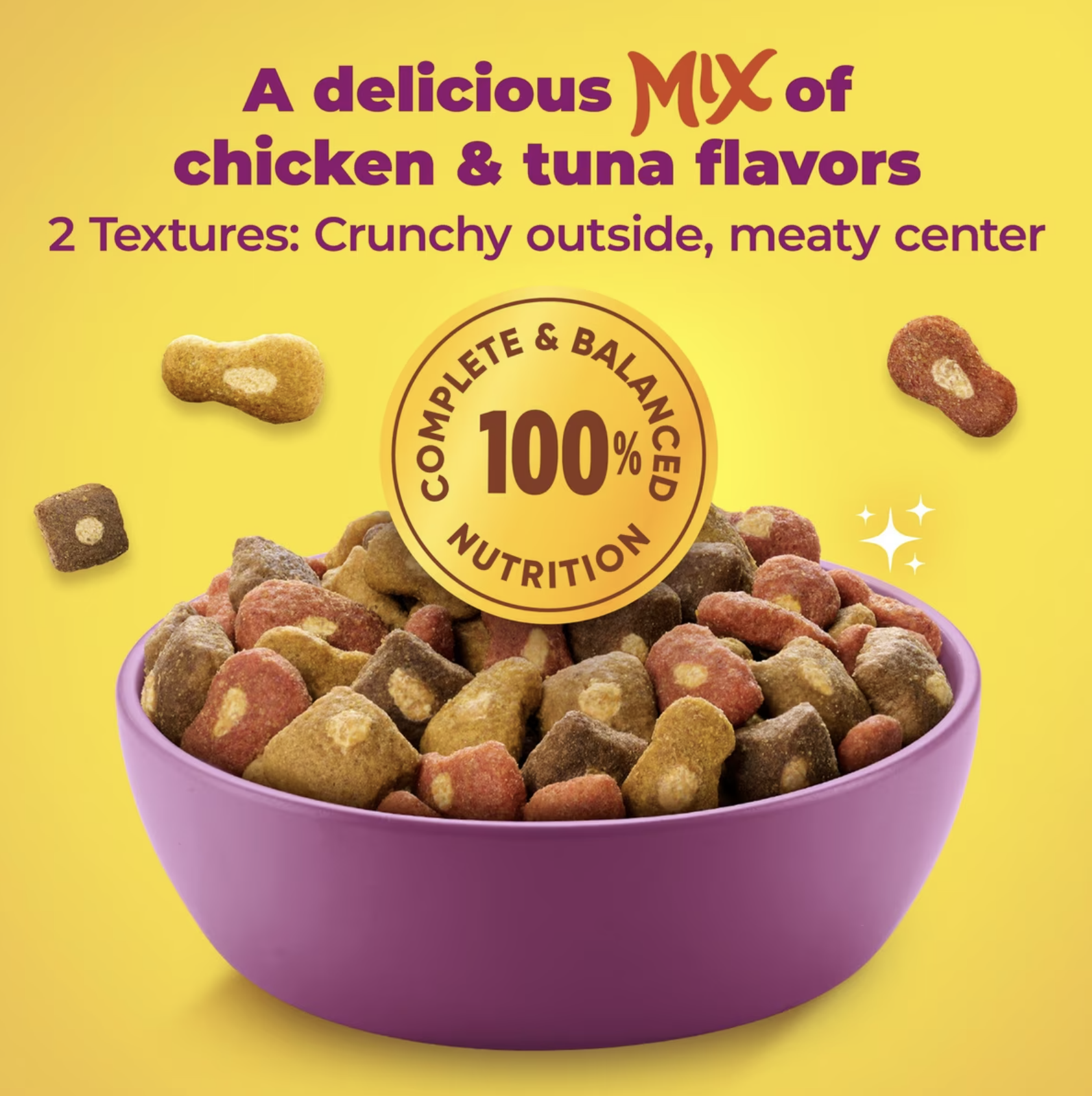 A purple bowl filled with multicoloured two-texture Meow Mix Tender Centers kibble with a complete and balanced nutrition seal