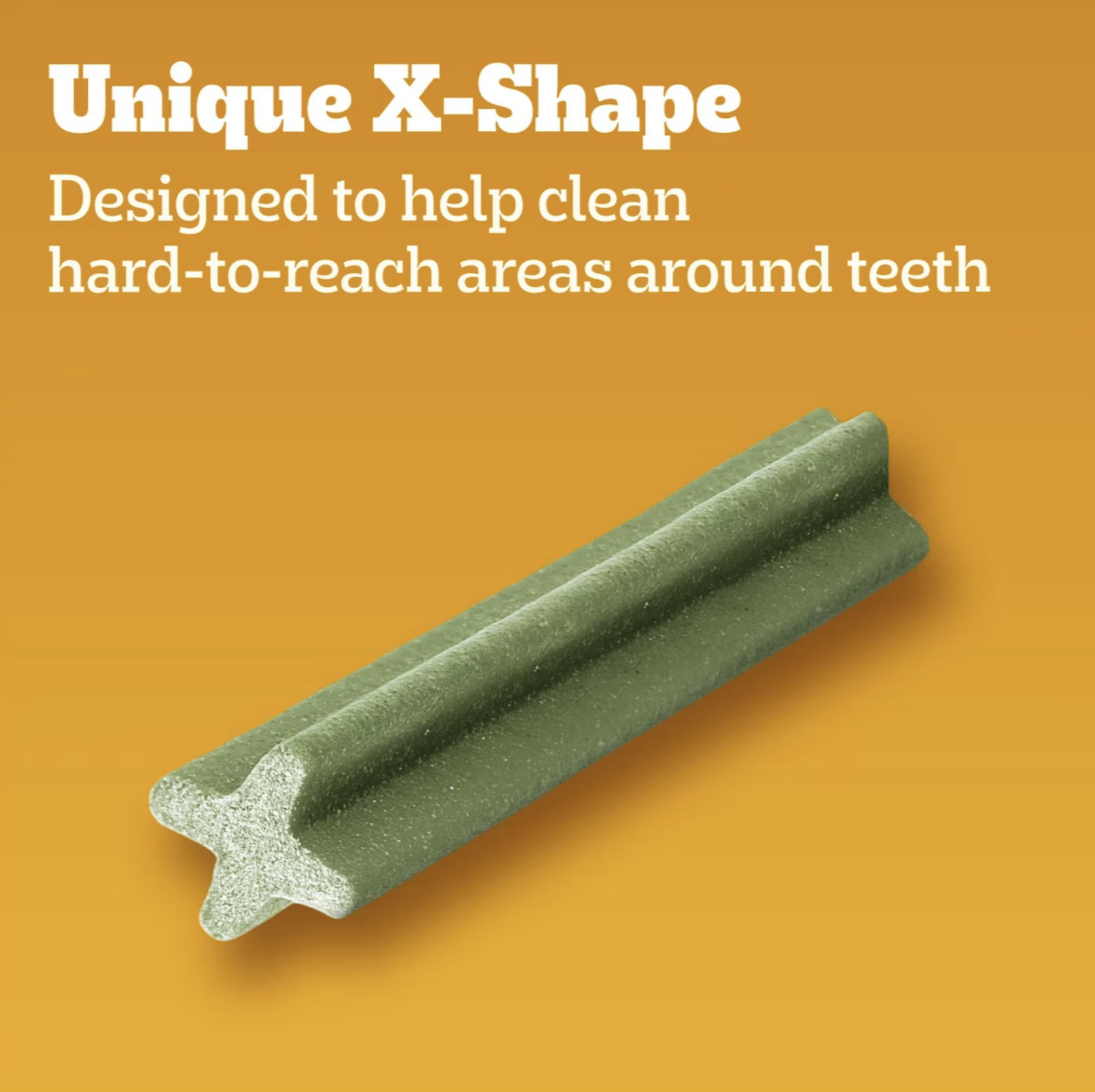 Close view of the X-shaped Dentastix chew showing its ridged cross-section